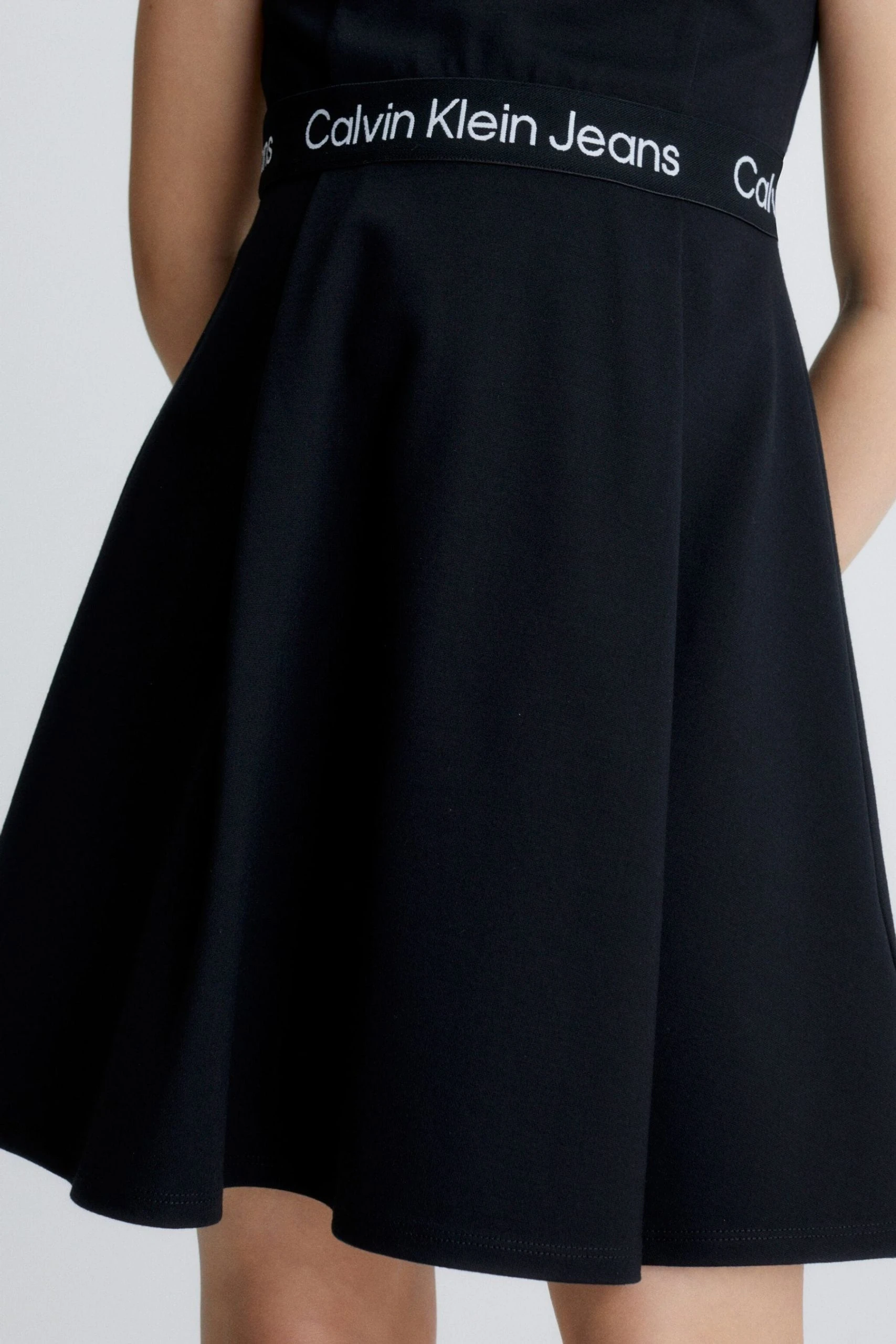 Calvin Klein Jeans Girls Black Logo Tape Punto Sleeveless Dress 6 Calvin Klein Jeans Girls Black Logo Tape Punto Sleeveless Dress - Image 4
