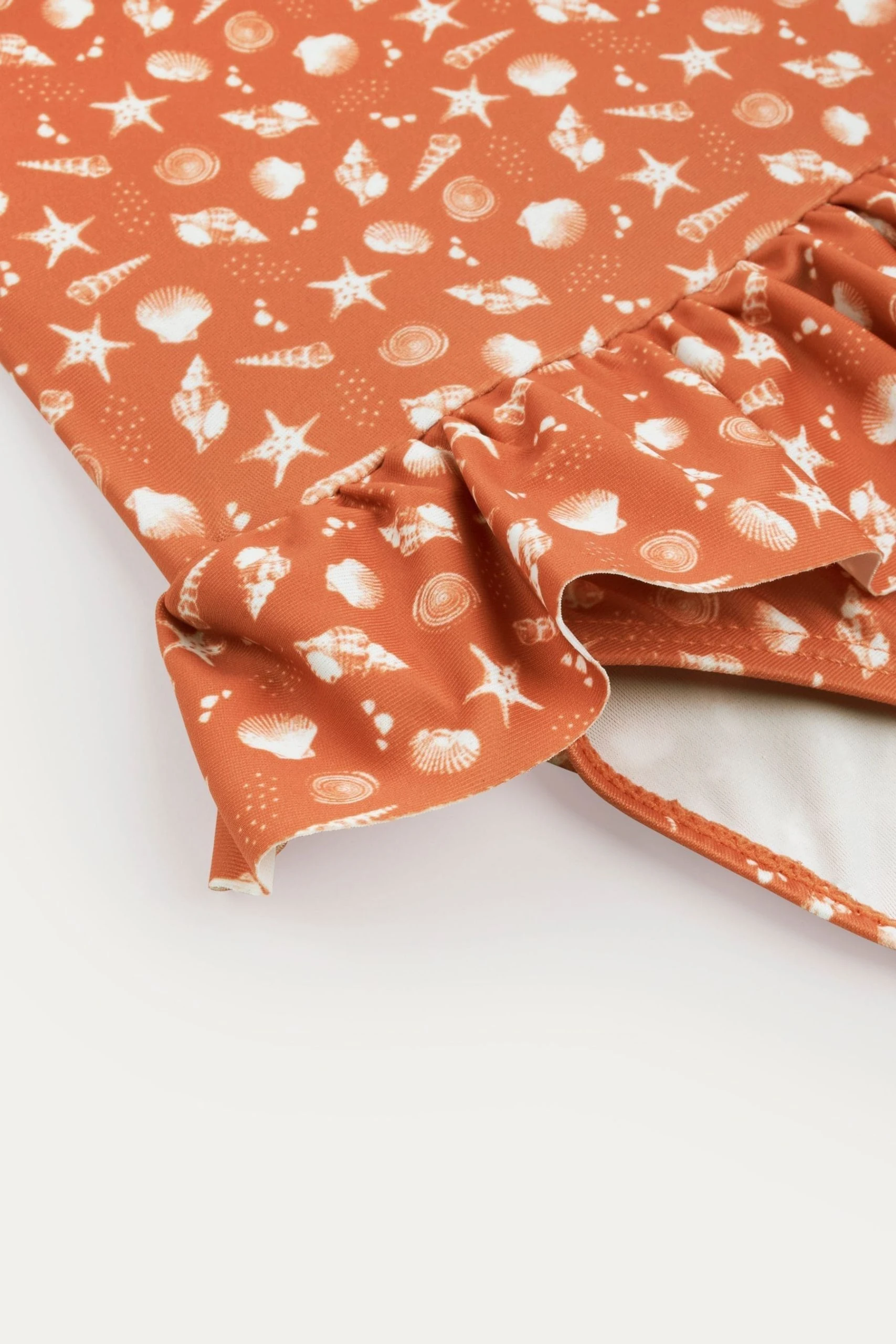 KIDLY Orange Recycled Frill Swimsuit 6 KIDLY Orange Recycled Frill Swimsuit - Image 4