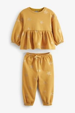 Next Ochre Yellow/Cream Glitter Star Print Peplum Hem Jumper And Joggers Set (3mths-7yrs) 12 Next Ochre Yellow/Cream Glitter Star Print Peplum Hem Jumper And Joggers Set (3mths-7yrs) -Angel & Rocket Shop C39632s5