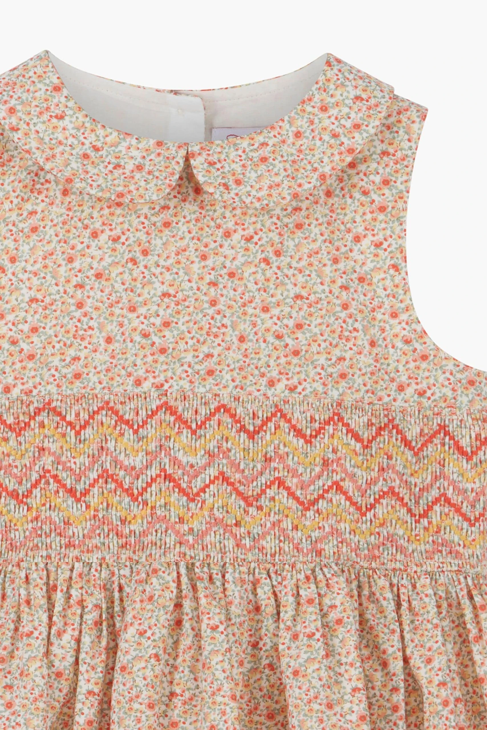 Trotters London Tangerine Esme Floral Smocked Dress 6 Trotters London Tangerine Esme Floral Smocked Dress - Image 4