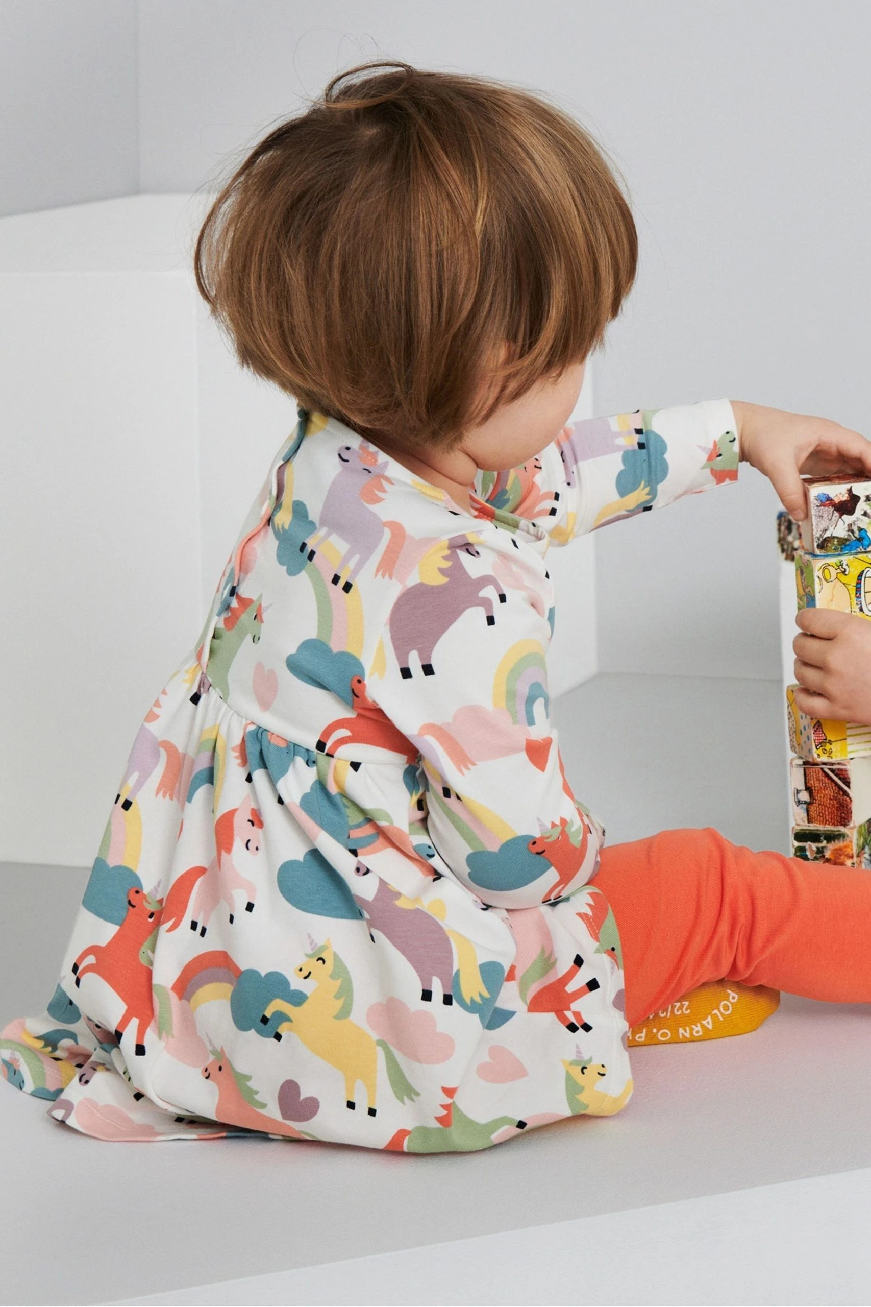 Polarn O. Pyret White Organic Unicorn Print Dress 6 Polarn O. Pyret White Organic Unicorn Print Dress - Image 4
